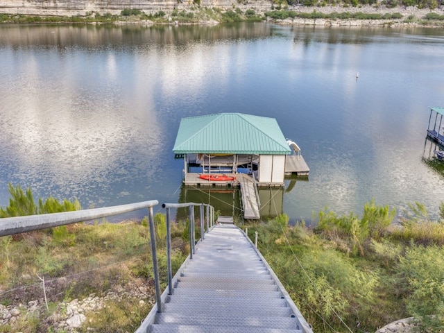 view of dock with a water view