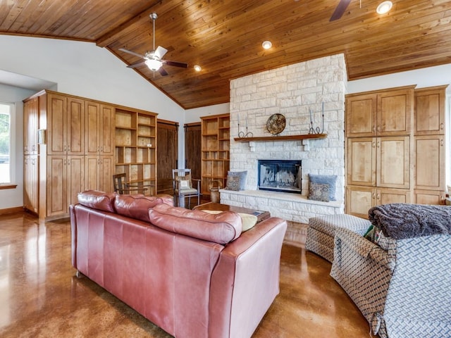 living room featuring a fireplace, concrete floors, and ceiling fan