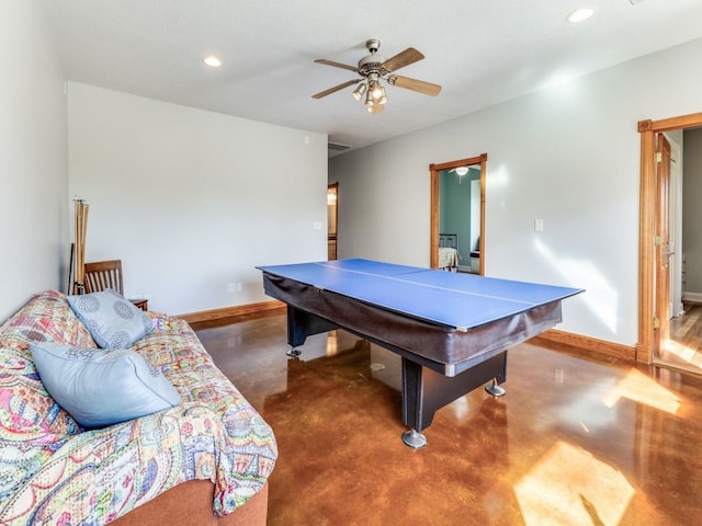 game room featuring concrete floors and ceiling fan