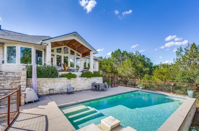 view of pool featuring a patio area