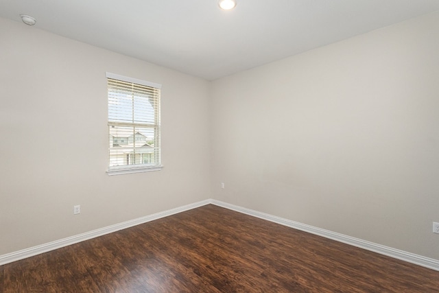 unfurnished room featuring hardwood / wood-style floors