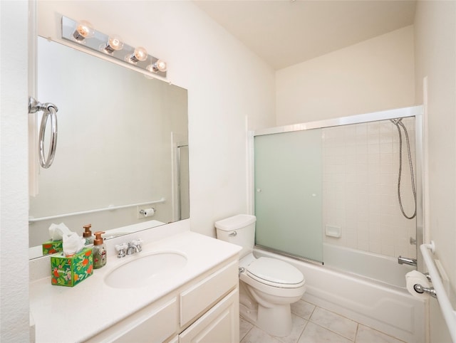 full bathroom with tile patterned floors, enclosed tub / shower combo, toilet, and vanity