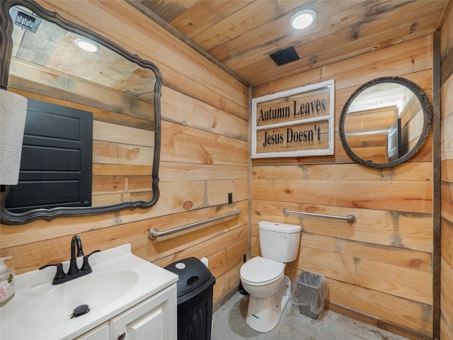 bathroom with vanity, wooden walls, toilet, and wood ceiling