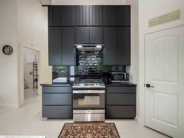 kitchen featuring appliances with stainless steel finishes and decorative backsplash