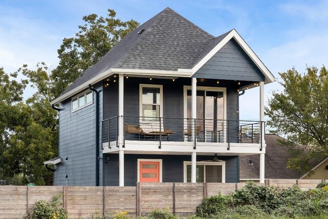 6217 Clovis St Unit B, Austin, TX 78741 - view of front of home featuring a balcony and roof with shingles