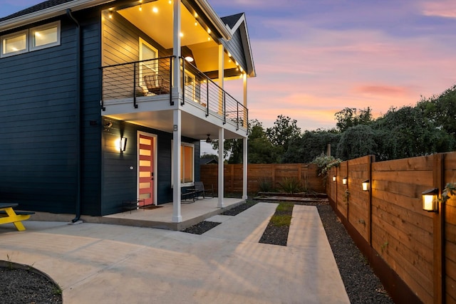 exterior space with a patio area and a balcony