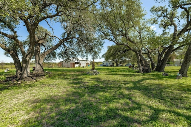 view of yard with fence