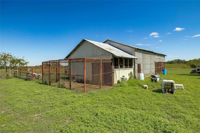 view of poultry coop with a lawn