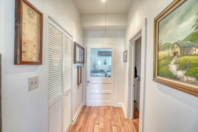 hallway featuring light hardwood / wood-style flooring