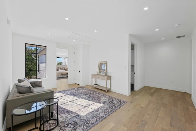 living area with light hardwood / wood-style floors