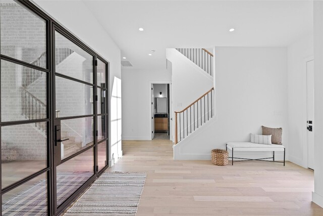 foyer entrance featuring light hardwood / wood-style flooring