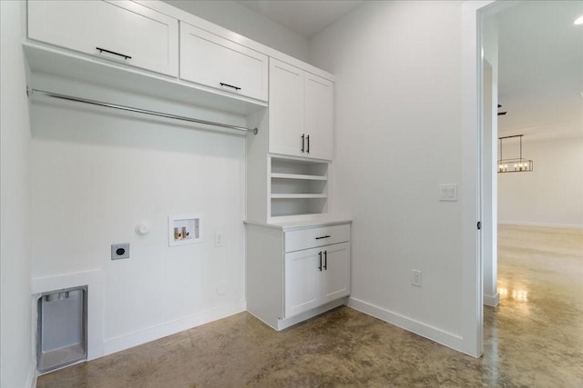 laundry room with baseboards, cabinet space, gas dryer hookup, electric dryer hookup, and washer hookup