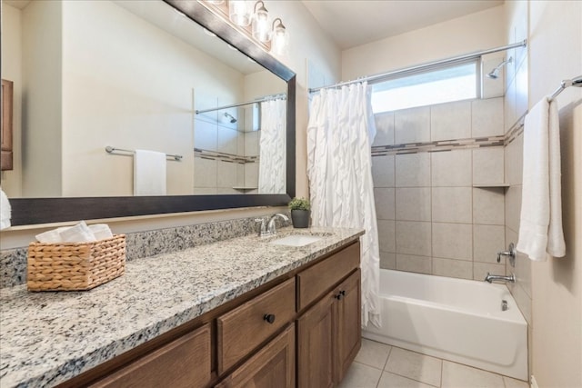 full bath with tile patterned flooring, vanity, and shower / bathtub combination with curtain