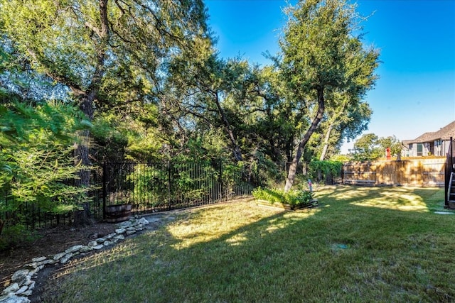 view of yard with fence