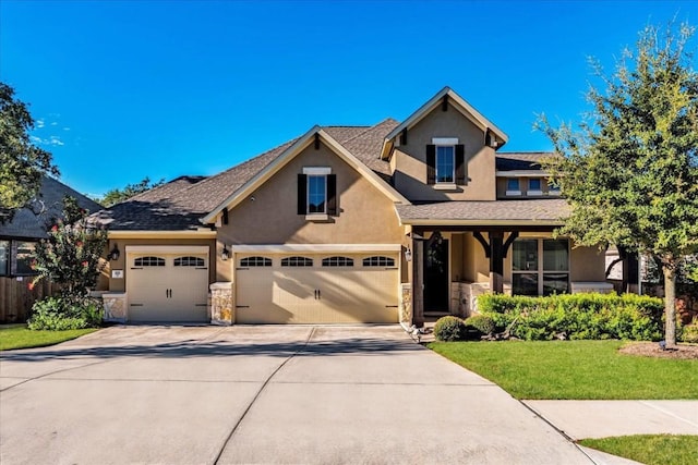 view of front of property with stone siding and stucco siding