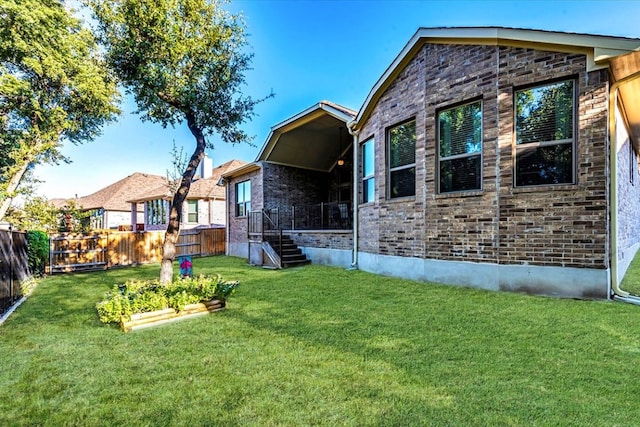 view of yard featuring fence