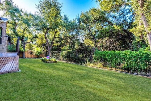 view of yard with fence