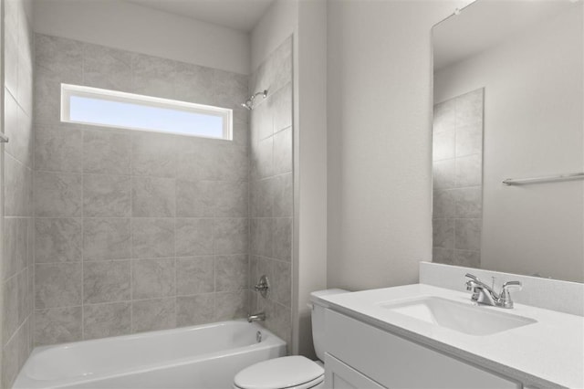 full bathroom featuring toilet, vanity, and shower / bathing tub combination