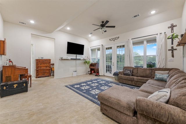 living room with french doors, lofted ceiling, and ceiling fan