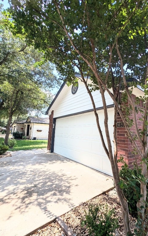 view of home's exterior with a garage