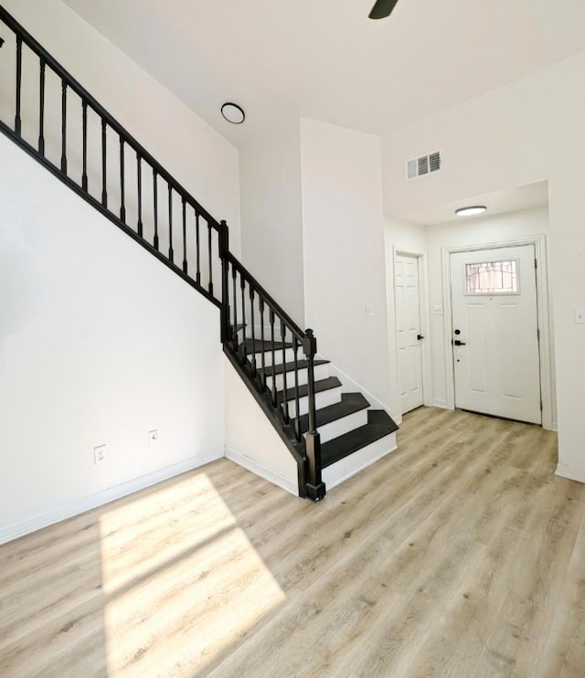 foyer with light hardwood / wood-style floors