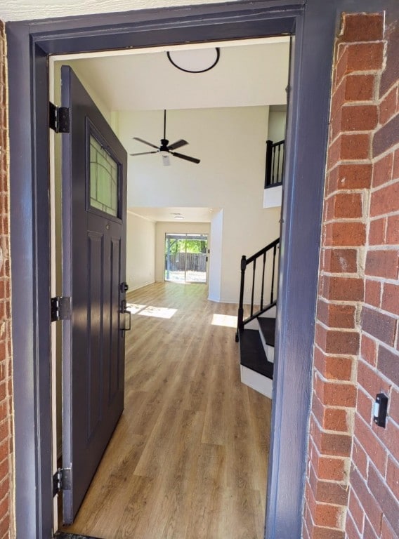 hallway featuring hardwood / wood-style floors