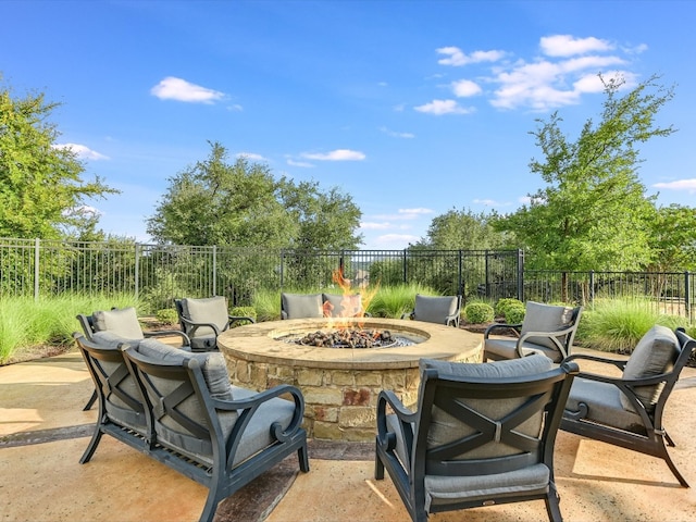 view of patio / terrace with a fire pit