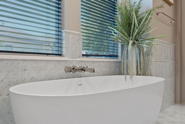 bathroom featuring a tub