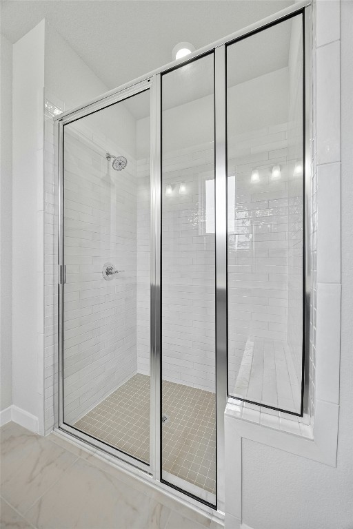 bathroom with an enclosed shower