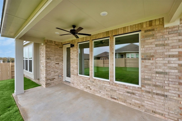 view of patio featuring ceiling fan