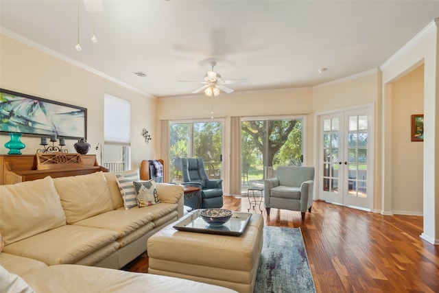 living room with ceiling fan, ornamental molding, french doors, and dark wood-type flooring