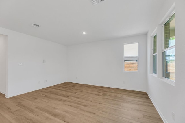 1004 Stonehill Dr, Georgetown, TX 78633 - spare room featuring light wood-style flooring, baseboards, and recessed lighting