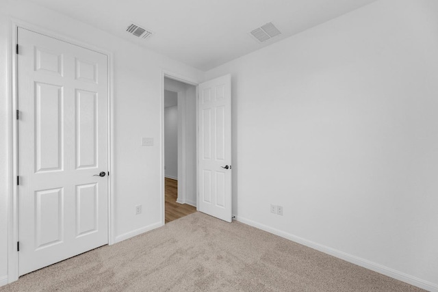 1004 Stonehill Dr, Georgetown, TX 78633 - unfurnished bedroom with carpet floors and baseboards