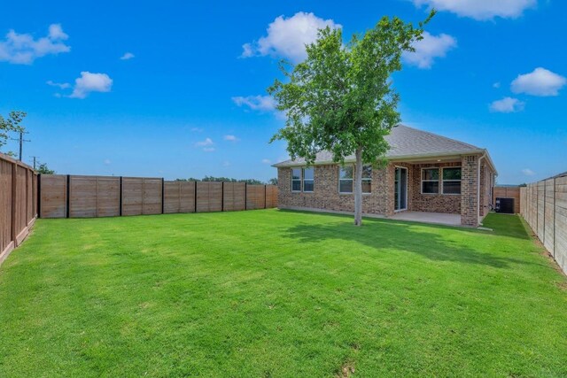 1004 Stonehill Dr, Georgetown, TX 78633 - view of yard with central air condition unit and a patio area