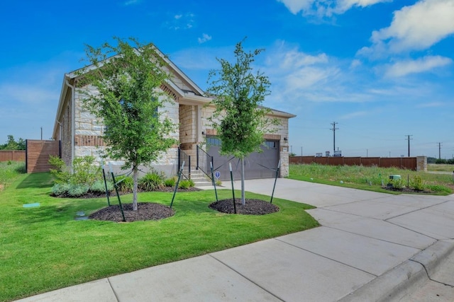 1004 Stonehill Dr, Georgetown, TX 78633 - obstructed view of property with stone siding, driveway, and a garage