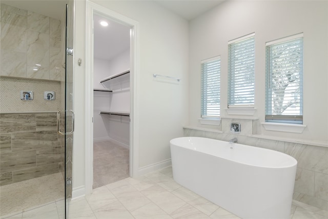 bathroom with independent shower and bath