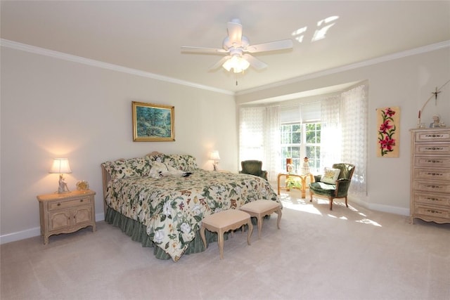 bedroom with baseboards, ornamental molding, and carpet flooring