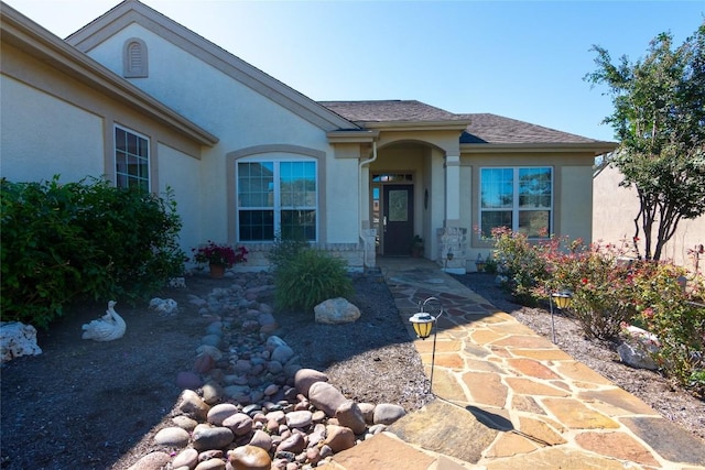 view of front of property featuring stucco siding