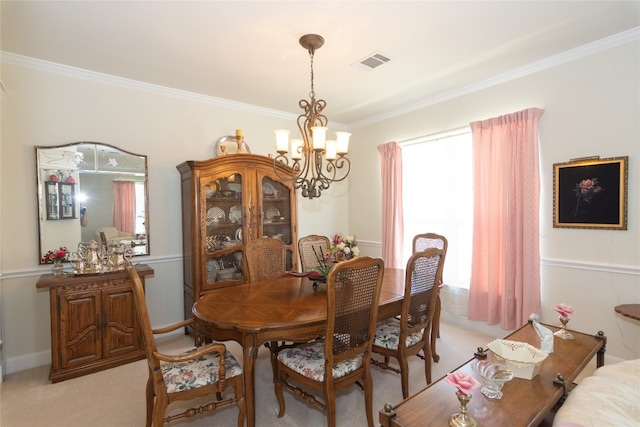 carpeted dining space featuring a chandelier, a wealth of natural light, and ornamental molding