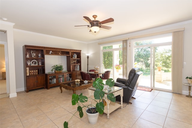 living room featuring ceiling fan, light tile patterned floors, and ornamental molding