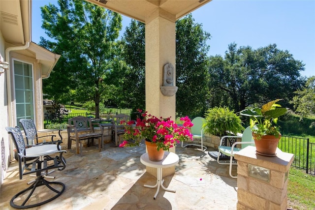 view of patio / terrace with fence