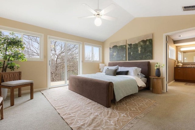 bedroom featuring access to exterior, light colored carpet, visible vents, and multiple windows