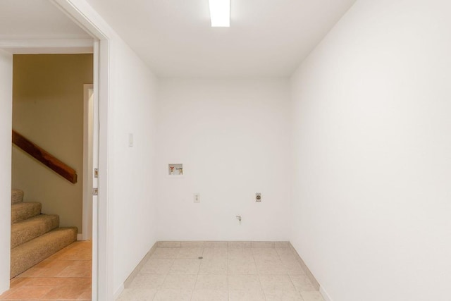 clothes washing area featuring hookup for a washing machine, baseboards, and hookup for an electric dryer