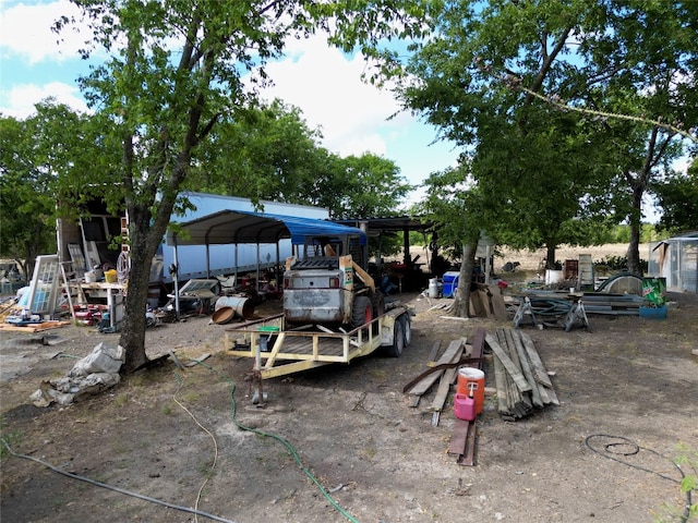 view of yard with a carport