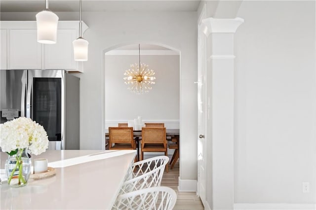 dining room featuring a chandelier and light hardwood / wood-style floors