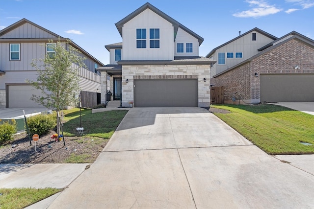 view of front of property with a garage and a front lawn