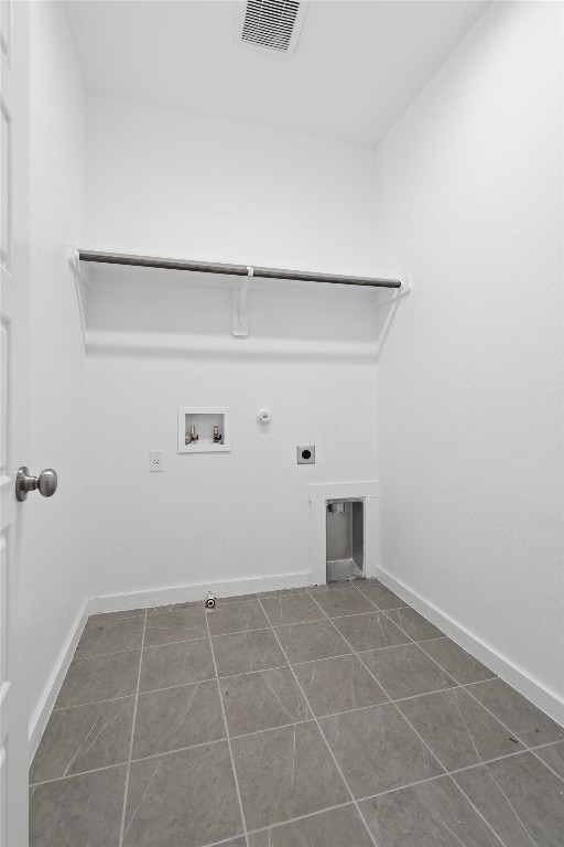 laundry room with washer hookup, tile patterned flooring, electric dryer hookup, and hookup for a gas dryer