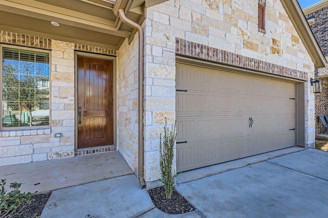 entrance to property with stone siding