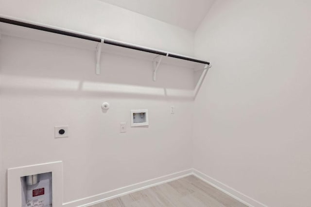 clothes washing area featuring electric dryer hookup, hookup for a gas dryer, baseboards, hookup for a washing machine, and laundry area