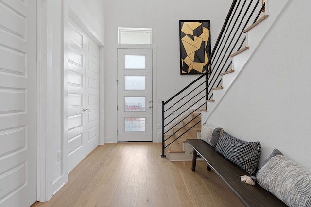 entrance foyer with light hardwood / wood-style floors